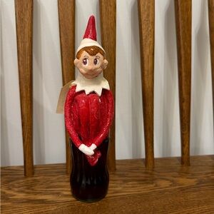 vintage Coca-Cola 8 oz glass bottle with a custom-made Santa's El